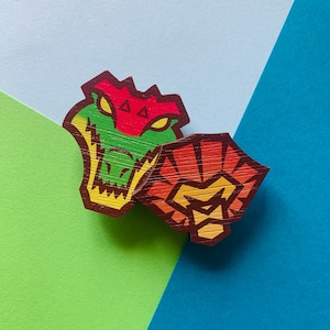 Lion and Croc pins