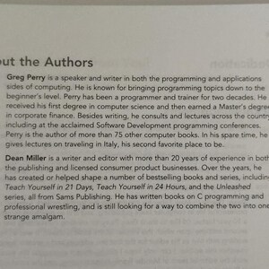 May include: A page from a book about the authors, Greg Perry and Dean Miller. The text describes their backgrounds and experience in programming, writing, and publishing.