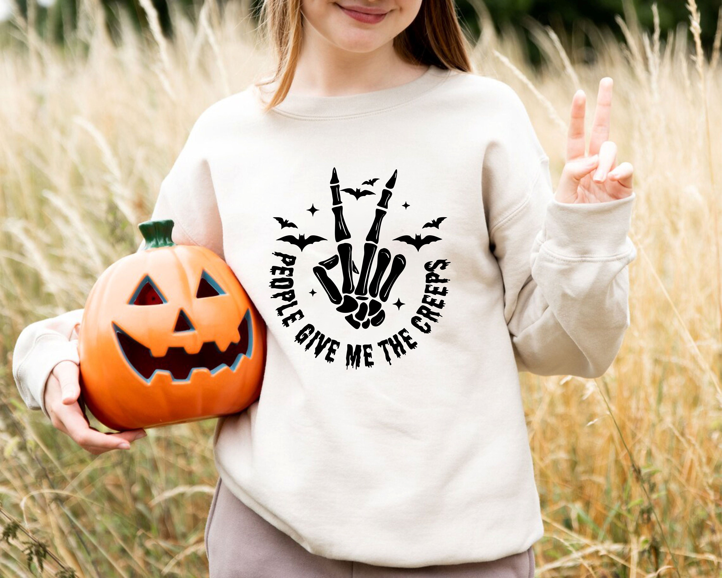 Discover People Give Me The Creeps Sweatshirt, Skeleton Hands, Peace Symbol, Scary Season Sweater, Bats Motif, Spooky Design, Witchy Halloween Spirit