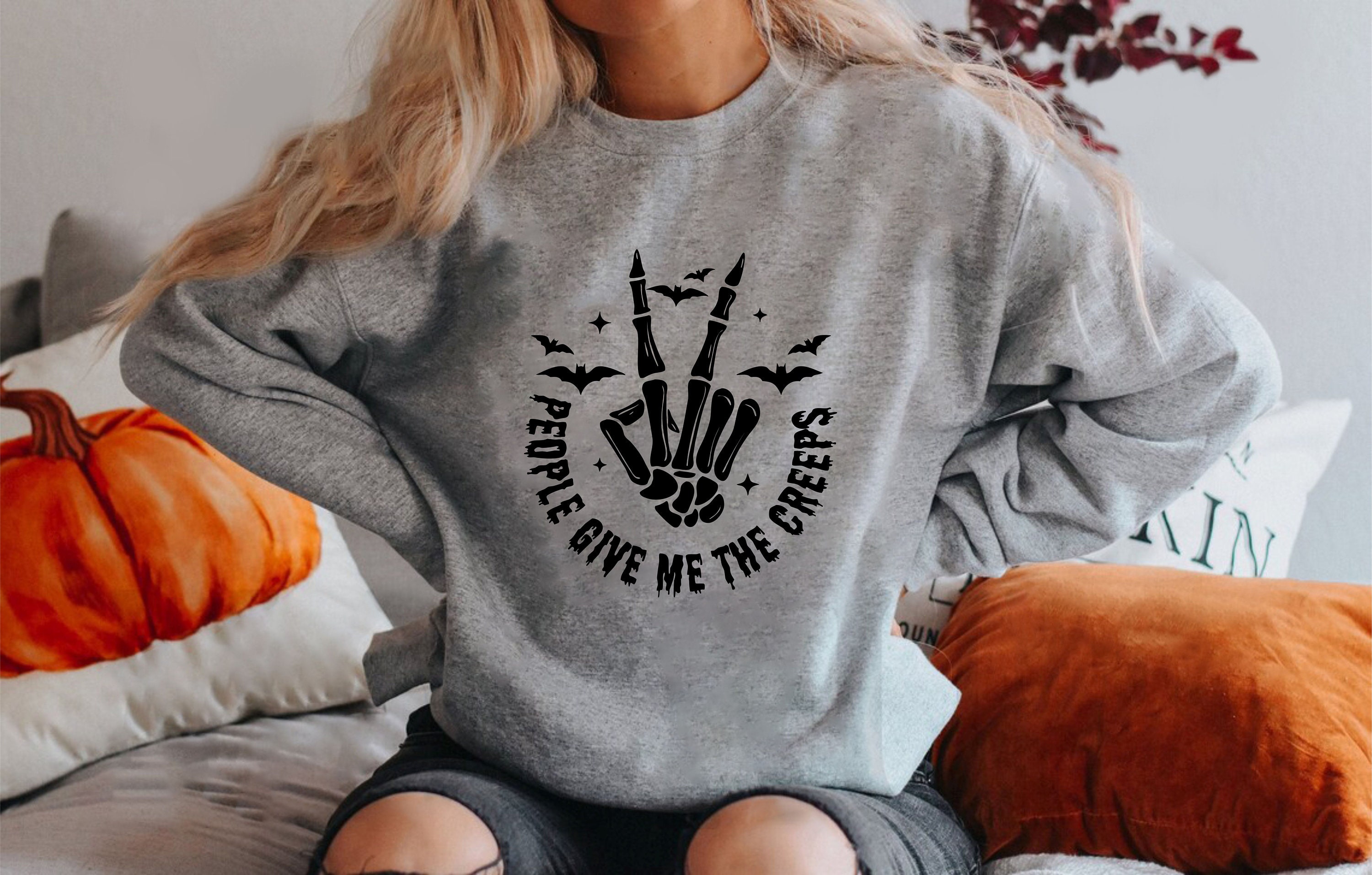 Discover People Give Me The Creeps Sweatshirt, Skeleton Hands, Peace Symbol, Scary Season Sweater, Bats Motif, Spooky Design, Witchy Halloween Spirit