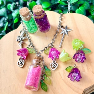 May include: A set of three ceramic mugs with a speckled, matte finish. The mugs are in shades of cream, light gray, and dark gray. Each mug has a simple, minimalist design, perfect for coffee or tea.