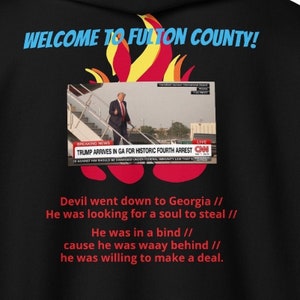 Devil Went Down to Georgia Trump Surrender Mug Shot Men&#39;s Classic Tee | Unisex heavy blend zip hoodie