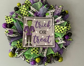 Halloween Frankenstein sign. Purple, green & black colors. Purple, green, black glitter accents with Frankenstein ribbon, Deco Mesh Wreath