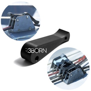 May include: A black plastic handle with the text "R3BORN" printed on it. The handle is designed to be used with a sailboat winch. Two close-up images show the winch in use.