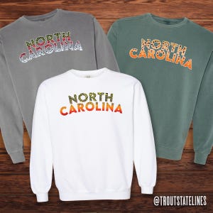 Comfort Colors Sweat
Fly Fishing Shirt
NC Vacation Apparel
NC Travel Sweatshirt
Trout Sweatshirt
North Carolina Trout
Soft Cotton Sweats
NC Brook Trout
NC Travel Souvenir
Trout Fishing Shirt
Comfy Sweatshirt NC
Carolina Brown Trout
Carolina Fishing