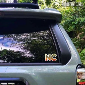 North Carolina Sticker Trout, Decal Fly Fishing, 
Outdoors Trout Gift, Angler Fish Camping,
Hiking NC Gifts, Souvenirs Gear, Travel Stickers,
Nature Lover, Travel Adventures, Lake River Life, Mountain Hiker, Trout Fishing, Cooler, Traveler Fish
