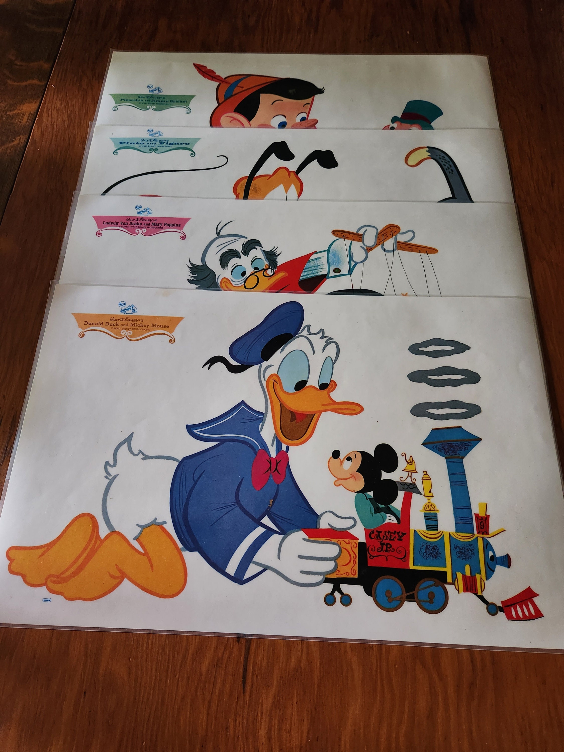4 Disney Placemats Set of 4, Vintage Ludwig Von Drake, Pinocchio, Donald Duck, Pluto. Etsy