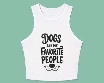 May include: White crop top with a black graphic that says "Dogs are my favorite people" with a black dog nose and mouth underneath.