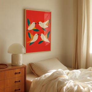 May include: A framed illustration of four white birds with red, green, and yellow accents on a red background.