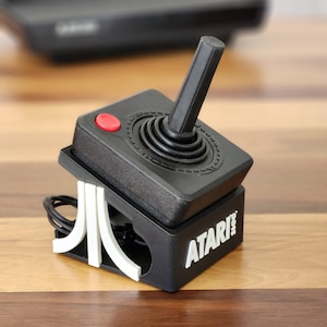 Expositor para joystick/controlador/decoración/sala de juegos Atari 2600 - Blanco