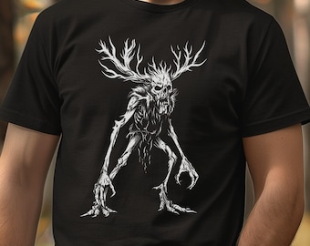 May include: A black t-shirt with a white graphic print of a skeletal creature with antlers. The creature has a menacing expression and appears to be standing on all fours.