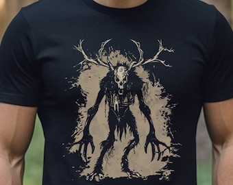 May include: Black t-shirt featuring a detailed illustration of a skeletal creature with antlers. The design is in shades of brown and black, creating a striking contrast against the shirt's dark background. The graphic is centered on the chest.