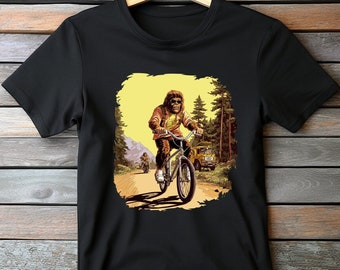 Funny Bigfoot Riding Bike Shirt: Sasquatch Camping Tee