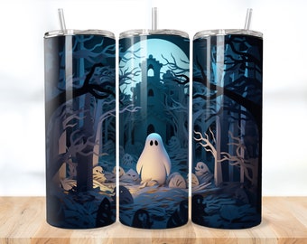 May include: Three stainless steel tumblers with a spooky Halloween design. The tumblers feature a dark blue and black forest scene with a white ghost in the centre. The design is reminiscent of paper cutouts.