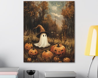 May include: A white ghost wearing a brown witch hat stands in a forest setting surrounded by orange pumpkins. The pumpkins have carved faces and are scattered on the ground. The background is a dark forest with trees and leaves.