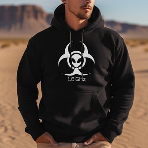 May include: Black hooded sweatshirt with a white biohazard symbol featuring an alien face and the text "1.6 GHz".