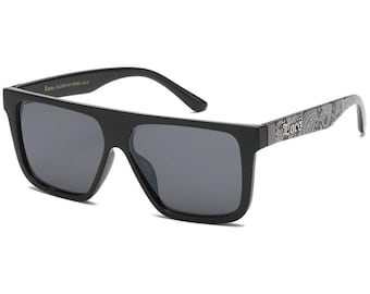 May include: Black square-shaped sunglasses with a paisley pattern on the arms. The sunglasses have a black frame and dark lenses. The brand name "L.O.C.K." is printed on the arm.