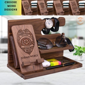 May include: A wooden organizer with a phone stand, watch holder, and slots for keys, glasses, and other accessories. The organizer is personalized with the text "Jodan Werly" and a police officer badge design.