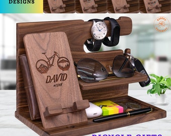 May include: A wooden organizer with a phone stand, watch holder, and a compartment for keys and other small items. The organizer is engraved with a bicycle design and the text "DAVID #1 FAN".