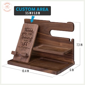 May include: A wooden desk organizer with a phone stand, tray, and watch holder. The organizer has the text "Thank you for being in my life" and the name "Johnny" engraved on it. Dimensions are 10.4 inches long, 6 inches wide, and 7.3 inches high.