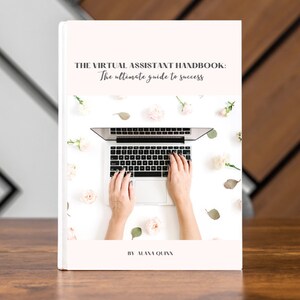 May include: The cover of a book titled "The Virtual Assistant Handbook: The ultimate guide to success" by Alana Owens. The cover features a white background with a laptop computer and white flowers.
