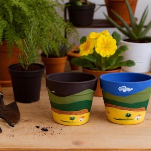 Macetas de terracota pintadas a mano: decoración paisajística