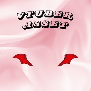 May include: A pink background with the text "VTUBER ASSET" in black bold letters. Two red devil wings are on either side of the text.