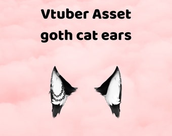 Può includere: Orecchie di gatto nere e bianche con un accessorio a catena argentata. Le orecchie sono progettate per essere utilizzate come accessorio per avatar virtuale.