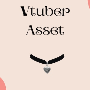 May include: A black choker necklace with a silver heart pendant. The heart has a detailed design.