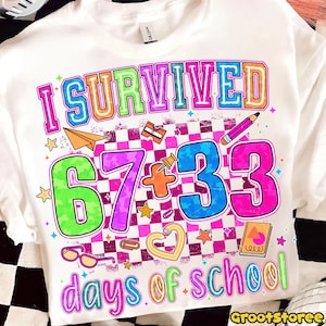 May include: White t-shirt with the text "I SURVIVED 67+33 days of school" in colorful, outlined letters. The design includes a checkered background, stars, and school-themed graphics like a pencil and paper airplane.