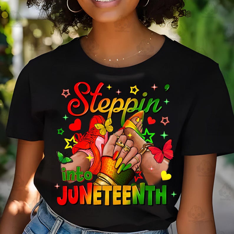 May include: Black t-shirt with the text "Steppin' into Juneteenth" in red, yellow, and green. The graphic includes hands, butterflies, stars, and hearts in vibrant colors. The design features a shoe and sandals.