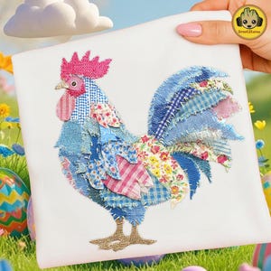 May include: A white square textile features a colorful patchwork rooster design. The rooster has a pink comb and wattle, with blue, pink, and floral patterned fabric making up its body and tail. The rooster's feet are gold.