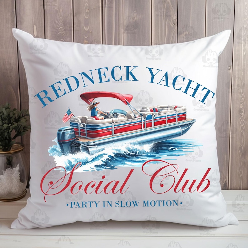 May include: White throw pillow with a red, white, and blue illustration of a pontoon boat on a lake. The text "Redneck Yacht Social Club" is in blue and red lettering. The text "Party in Slow Motion" is in smaller blue lettering.