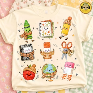 以下が含まれることがあります： クリーム色のTシャツで、緑のクレヨン、秋の葉が描かれたスパイラルノート、黄色の鉛筆、黒いノート、スティックのり、ハサミ、リンゴ、地球儀、消しゴムなど、秋らしい温かみのある服を着た9つの擬人化された学用品のグラフィックプリントが施されています。