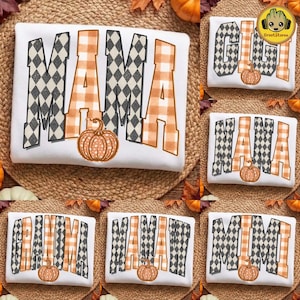 May include: A white sweatshirt featuring the word MAMA in a black and white diamond pattern and orange plaid print, with an orange pumpkin graphic. Other variations include the words GIGI, NANA, GRANDMA, MAMAW, and MIMI, each with a pumpkin.