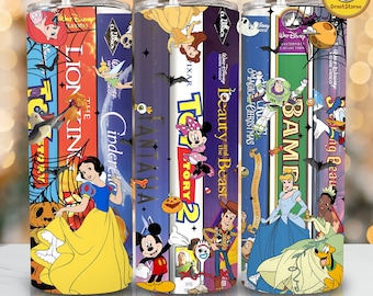 May include: A set of three stainless steel tumblers featuring colorful designs inspired by Disney animated films. Each tumbler showcases iconic characters and movie titles like "The Lion King," "Cinderella," and "Toy Story."