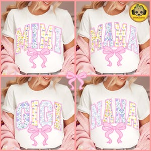 May include: White t-shirts with floral and bow designs. Each shirt features a different name: "MIMI", "MAMA", "GIGI", and "NANA". The names are in a floral patchwork style with a pink bow below.