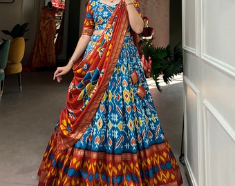Blue Red women designer party wear Embrace the elegance of patola prints, where tradition meets trend in every twirl of a printed lehenga