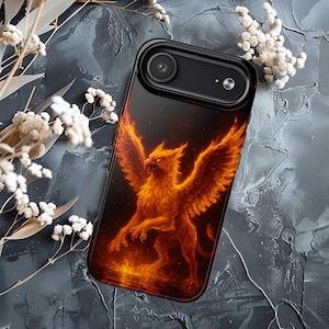 May include: Black phone case featuring a fiery griffin design. The artwork depicts a mythical creature with outstretched wings, rendered in shades of orange and red against a dark background. The case has a glossy finish and a camera cutout.