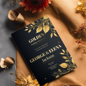May include: A black and gold wedding anniversary invitation with gold leaf accents and the text "GOLDEN Wedding Anniversary" and "JOIN US FOR A 50TH WEDDING ANNIVERSARY PARTY FOR GEORGE & ELENA Jackson 6PM AUGUST 13TH, 2023 422 HERITAGE ROAD TERRA BELLA, CALIFORNIA"