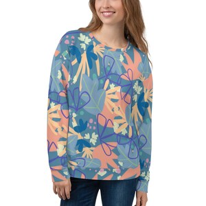 sudadera unixes con flores ilustradas