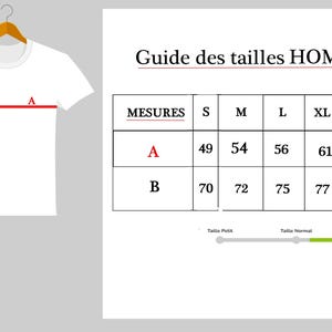 May include: A white t-shirt hanging on a wooden hanger, with a size chart labeled "Guide des tailles HOMMES" in French. The chart shows measurements for sizes S to 3XL, with measurements in centimeters.