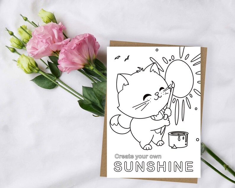 May include: Black and white coloring page featuring a cute cat painting a sun with a paintbrush. The text "Create your own SUNSHINE" is at the bottom of the page.
