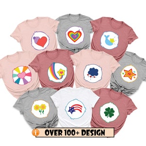 May include: Ten different Care Bear t-shirt designs featuring various Care Bear characters and symbols. The designs include a rainbow, a heart, a cloud, a star, a flower, and a shamrock. The text "OVER 100+ DESIGN" is at the bottom of the image.