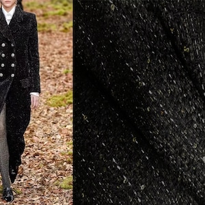Black/Gold Shimmering Threads and Small Sequins - French Tweed - 150 cm Wide.