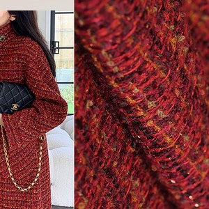Shades of Red/Maroon with Gold Stitching  -  French Tweed -  148cm Wide.