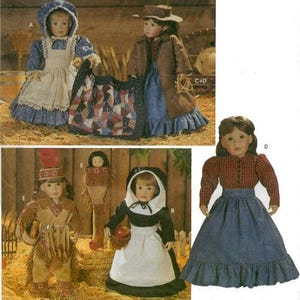 Könnte beinhalten: Eine Sammlung von Vintage-Puppen in historischen und kulturellen Kostümen. Die Puppen umfassen ein Pionier-Mädchen, einen amerikanischen Ureinwohner, eine Pilgerin und ein Cowgirl, jeweils mit detaillierter Kleidung und Accessoires. Die Puppen sind vor einem rustikalen Hintergrund platziert.