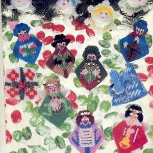 May include: A collection of 12 colorful plastic canvas ornaments featuring various holiday themes, including angels, a snowman, a Christmas tree, and a Santa Claus. The ornaments are decorated with beads and sequins. The text "produced by Jean Leinhauser" is printed at the bottom of the image.