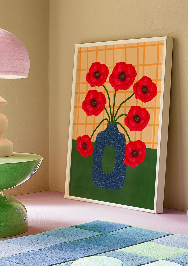 May include: A framed print of a blue vase with red poppy flowers against a yellow and green background. The vase is textured and the flowers are stylized.