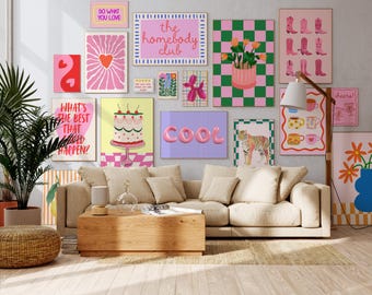May include: A living room interior with a white wall decorated with colorful framed prints featuring various designs and text, including "What's the best that could happen?", "Do what you love", "the homebody club", "COOL", and "cheers!" The prints are arranged in a grid pattern. A beige sofa with pillows sits in front of the wall. A wooden coffee table sits in front of the sofa. A wicker ottoman sits in front of the coffee table. A potted plant sits on the left side of the image.